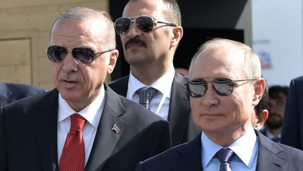 Russian President Vladimir Putin (R) and his Turkish counterpart Recep Tayyip Erdogan visit the MAKS-2019 International Aviation and Space Salon opening day in Zhukovsky outside of Moscow on August 27, 2019. (Alexey NIKOLSKY / SPUTNIK / AFP)