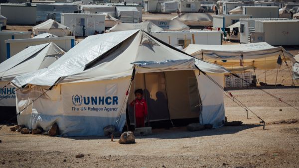 Syrian child standing outside her tent at the Zaatari Refugee camp in Mafraq, jordan. (Shutterstock/ File Photo)