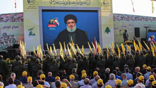 Sympathisers of the Shiite Hezbollah movement gather to watch the transmission on a large screen of a speech by the movement's leader Hasan Nasrallah (AFP)