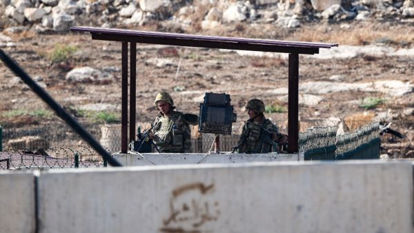 Members of the Turkish gendarmerie man an outpost along the border with Syria near the Syrian town of Atme in the northwestern Idlib province  (AFP)