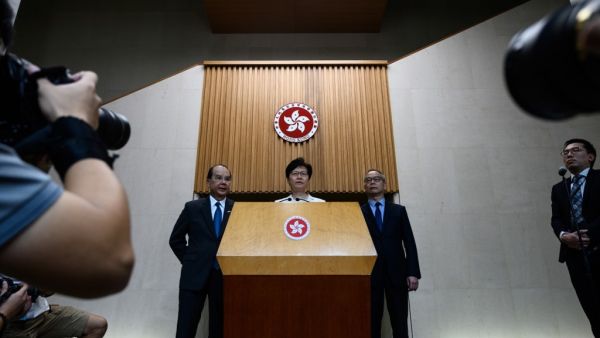 Hong Kong Chief Executive Carrie Lam (C) speaks at a press conference in Hong Kong on September 5, 2019, a day after she announced the withdrawal of a loathed extradition bill. (AFP/ File Photo)