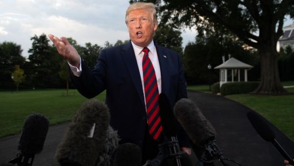 US President Donald Trump gestures as he speaks to the media prior to departing on Marine One from the South Lawn of the White House in Washington, DC, September 12, 2019. (AFP/ File Photo)