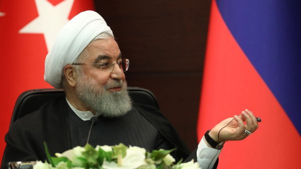 Iranian President Hassan Rouhani speaks during a joint press conference with Turkish and Russian counterparts following a trilateral meeting on Syria, in Ankara on September 16, 2019. (Adem ALTAN / AFP)