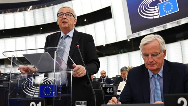 European Commission President Jean-Claude Juncker (L) gestures as he speaks past EU chief Brexit negotiator Michel Barnier during a debate on Brexit at the European Parliament in Strasbourg, northeastern France on September 18, 2019. (FREDERICK FLORIN / AFP)