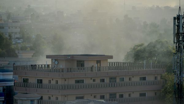 Smoke rises from a government building which is targeted by gunmen in Jalalabad on September 18, 2019.  (AFP/ File Photo)