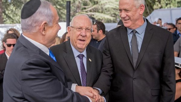 Israeli Prime Minister Benjamin Netanyahu (L), President Reuven Rivlin (C) and Benny Gantz, leader of Blue and White party (AFP)