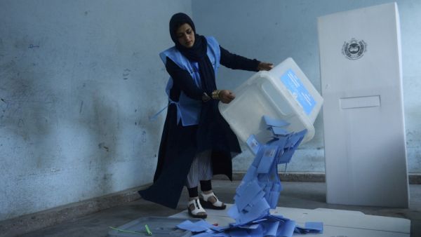 An Afghan Independent Election Commission (IEC) official empties a ballot box to count ballot papers after polling stations closed, in Herat on September 28, 2019. (AFP/ File Photo)