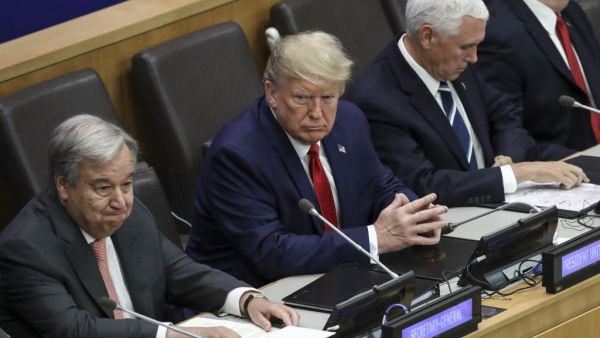 (L-R) United Nations (U.N.) Secretary General Antonio Guterres, U.S. President Donald Trump and Vice President Mike Pence attend a meeting on religious freedom at U.N. headquarters on September 23, 2019 in New York City. While hundreds of world leaders gather for the climate summit during the UN General Assembly, President Trump chose to skip the event in favor of his own meeting on religious freedom and persecution. Drew Angerer/Getty Images/AFP Drew Angerer / GETTY IMAGES NORTH AMERICA / AFP