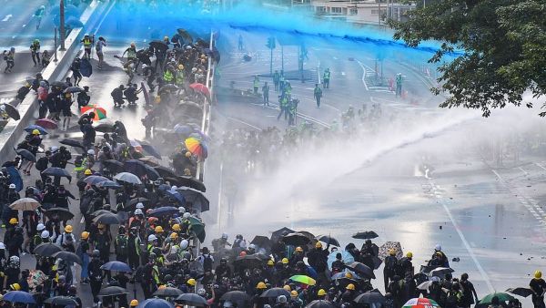 Police fired water cannons Pro-democracy protesters outside the government headquarters in Hong Kong. (AFP/ File Photo)