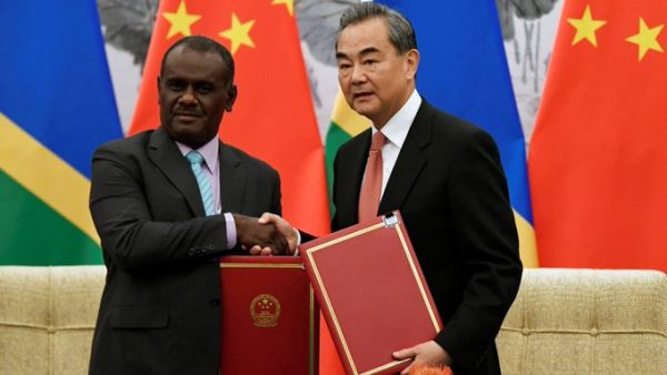 China's Foreign Minister Wang Yi and the Solomon Islands' Minister of Foreign Affairs Jeremiah Manele signed an agreement to form ties at a government guest house in the Chinese capital, Beijing (Twitter)