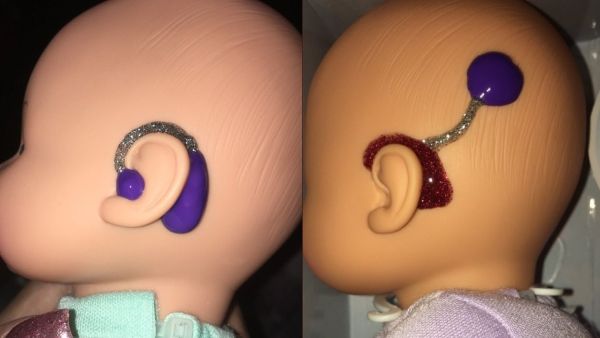 On another doll the pre-school teacher had created her own version of a cochlear implant in red, silver and purple glue. (Twitter)