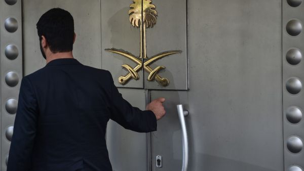 In this file photo taken on November 1, 2018, a Saudi official waits in front of the door of the Saudi Arabian consulate in the Turkish city of Istanbul. (AFP/ File Photo)