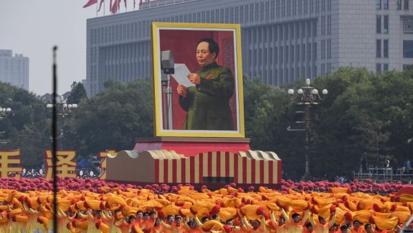 A giant portrait of former Chinese Communist Party leader Mao Zedong passes by Tiananmen Square during the National Day parade in Beijing on October 1, 2019, to mark the 70th anniversary of the founding of the People’s Republic of China. (Greg BAKER / AFP)