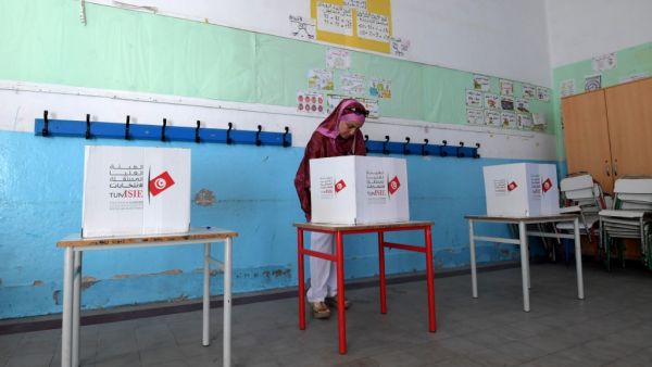 Some seven million voters are expected to head to polling stations, just weeks after the first round of the presidential polls swept aside the post-Arab Spring political establishment. (Fethi Belaid / AFP)