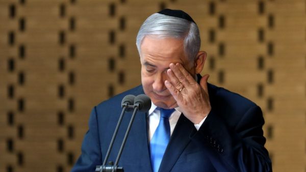 Israeli Prime Minister Benjamin Netanyahu delivers a speech at the state memorial ceremony for the fallen soldiers of the 1973 Yom Kippur War, at the Hall of Remembrance on Mt. Herzl in Jerusalem on October 10, 2019. GALI TIBBON / AFP