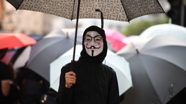 Hong Kong protesters arrested for defying a new face mask ban appeared in court on October 7 following a violent weekend of unrest which saw bloody clashes with police and widespread vandalism that crippled the city's train network. Mohd RASFAN / AFP