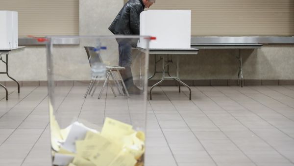 Polish nationals cast their ballots on October 12, 2019, in Chicago, Illinois, one day before parliamentary elections in Poland. KAMIL KRZACZYNSKI / AFP