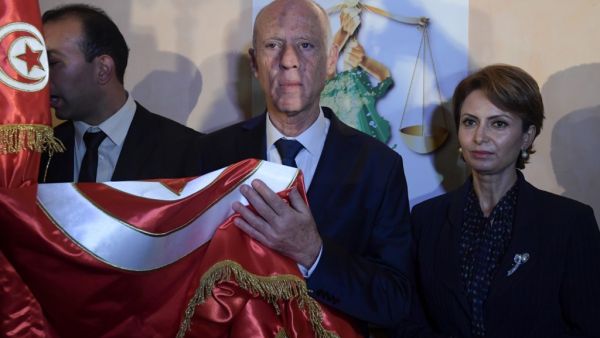 Saied won a landslide victory in Tunisia's presidential runoff, sweeping aside his rival, media magnate Nabil Karoui, state television Wataniya said. It said he scooped almost 77 percent of the vote, compared to 23 percent for Karoui. Fethi Belaid / AFP