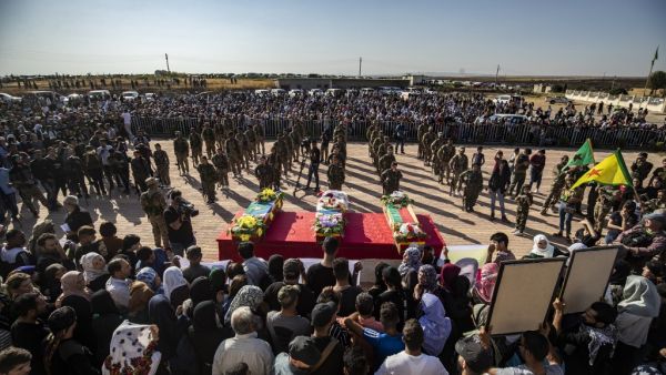 Mourners attend a funeral, for Kurdish political leader Hevrin Khalaf and others including civilians and Kurdish fighters, in the northeastern Syrian Kurdish town of Derik, known as al-Malikiyah in Arabic, on October 13, 2019.  (AFP/ File Photo)