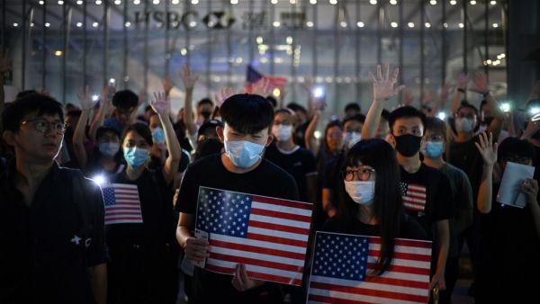 Protesters chant slogans as they attend a rally in Hong Kong on October 14, 2019, calling on US politicians to pass a bill that could alter Washington's relationship with the trading hub. (AFP/ File Photo)