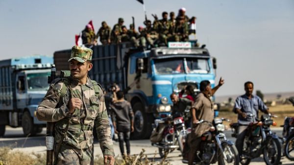 Syrian regime troops arrived after Damascus deployed troops to the country's north to contain a days-long Turkish offensive.  (Delil SOULEIMAN / AFP)