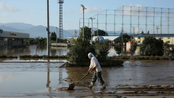 Rescuers in Japan worked around the clock on October 15 in an increasingly desperate search for survivors of a powerful weekend typhoon that killed more than 70 people and caused widespread destruction. (STR / JIJI PRESS / AFP)