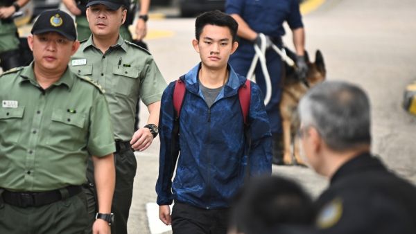 Chan Tong-kai, 20, wanted in Taiwan for the murder of his pregnant girlfriend during a holiday the two Hong Kongers took there in 2018, walks out the Pik Uk Prison in Hong Kong on October 23, 2019, after serving a short jail sentence for stealing his girlfriend's possessions. (AFP/ File Photo)