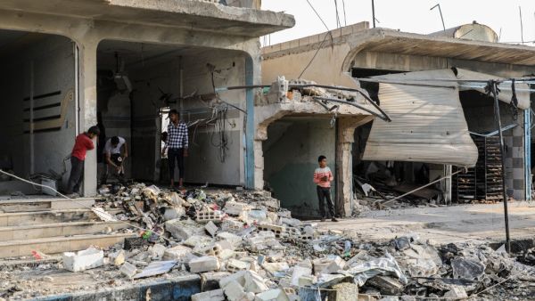 Rubble in a street at the scene of an explosion in the Syrian town of Suluk, near Tal Abyad close to the border with Turkey in the northern province of Raqqa (AFP)