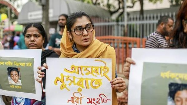 A 35-year-old who forcibly shaved his wife's head after finding a hair in his breakfast has today been arrested. Pictured are protesters against sexual violence in Bangladesh . (AFP/ File Photo)