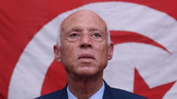 Tunisian presidential candidate Kais Saied speaks in Tunis on 17 September (AFP)