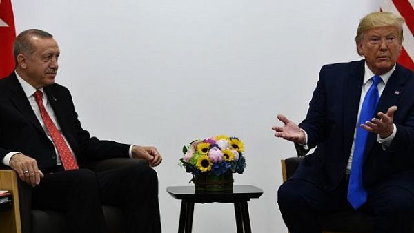 US President Donald Trump (R) and Turkish President Recep Tayyip Erdogan hold a bilateral meeting on the sidelines of the G20 Summit in Osaka on June 29, 2019. (Brendan Smialowski / AFP)