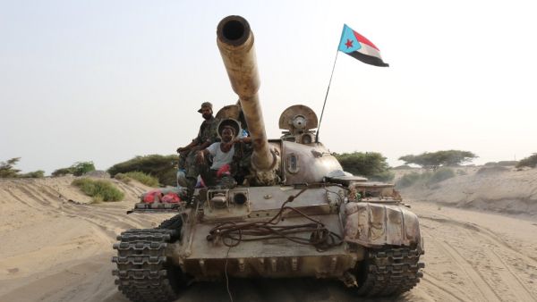 Fighters of the UAE-trained Security Belt Force, dominated by members of the the Southern Transitional Council (STC) which seeks independence for south Yemen, ride atop a tank in Yemen's southern coastal town of Shuqrah, east of the city of Aden, on August 27, 2019. (AFP/ File Photo)