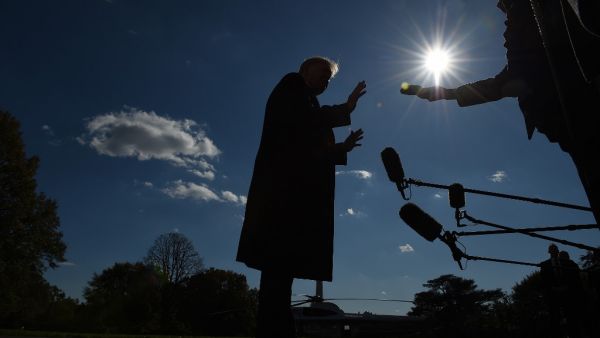 US President Donald Trump talks to the media on the South Lawn upon his return to the White House by Marine One, in Washington, DC, November 3, 2019, after returning from a trip to New York. Olivier Douliery / AFP