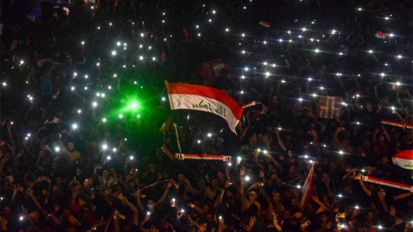 Iraqi protesters gather during a late anti-government demonstration in Nasiriyah, the capital of the southern province of Dhi Qar on November 4, 2019. AFP