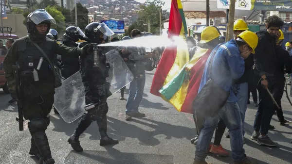 Riot police fire tear gas to disperse people taking part in a blockade to protest against the results of the October 20 elections in La Paz, on November 4, 2019. (AFP/ File Photo)