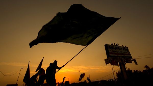 Iraqi protesters wave a flag during a demonstration during ongoing anti-government demonstrations in the southern city of Basra, on November 13, 2019. (AFP/ File Photo)