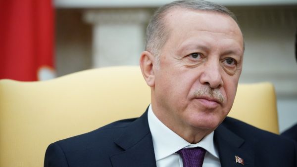 Turkey's President Recep Tayyip Erdoğan takes part in a meeting in the Oval Office of the White House in Washington, DC on November 13, 2019. President Donald Trump greeted his Turkish counterpart Recep Tayyip Erdogan at the White House for a high-stakes meeting Wednesday that underlined his claim to be ignoring the impeachment drama unfolding simultaneously in Congress. MANDEL NGAN / AFP