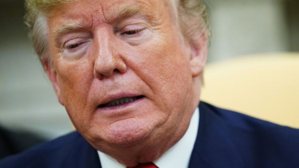 US President Donald Trump speaks during a meeting with Turkey's President Recep Tayyip Erdogan and a group of Republican senators in the Oval Office of the White House in Washington, DC on November 13, 2019. MANDEL NGAN / AFP
