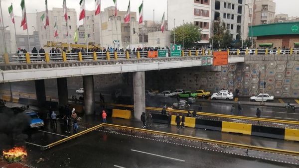Iranian protesters block a road during a demonstration against an increase in gasoline prices in the capital Tehran, on November 16, 2019.  (AFP/ File Photo)