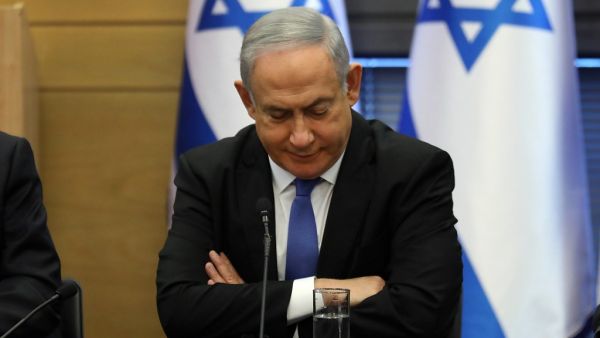 Israeli Prime Minister Benjamin Netanyahu reacts during a meeting of the right-wing bloc at the Knesset (Israeli parliament) in Jerusalem on November 20, 2019. (AFP/ File Photo)