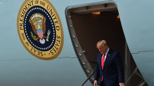 US President Donald Trump steps off Air Force One upon arrival at Austin–Bergstrom International Airport in Austin, Texas on November 20, 2019. Trump is in Austin to tour an Apple computer manufacturing facility where the Mac Pro is assembled. (MANDEL NGAN / AFP)