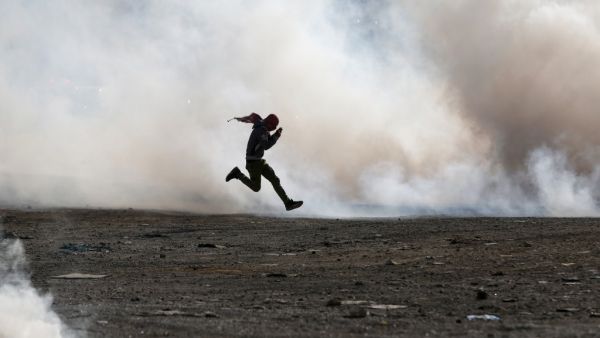 Palestinian demonstrators clash with Israeli security forces on November 26, 2019, in the West Bank city of Ramallah following a demonstration against the US policy shift on Israeli settlements in Palestinian Territories and following the death of Palestinian prisoner Sami Abu Diyak. ABBAS MOMANI / AFP