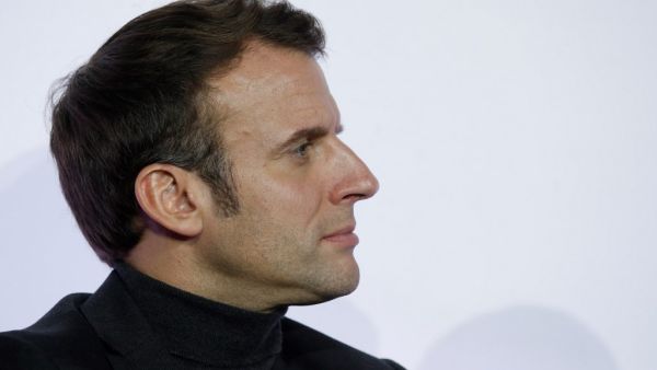 French President Emmanuel Macron looks on as he attends the ceremony marking the 80th anniversary of the French National Centre for Scientific Research (CNRS) at the Palais de la Decouverte in Paris, France, November 26, 2019. BENOIT TESSIER / POOL / AFP