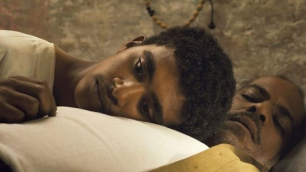 Muzamil (Shehata) and his father Alnour (Talal Afifi) in a scene from “You Will Die at 20.” (Photo courtesy of Ajyal)