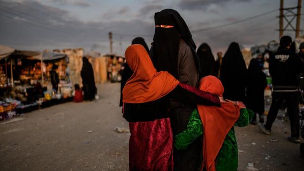 A veiled woman looks back at Al Hol camp in Hasakeh governorate in northeastern Syria. (AFP/ File Photo)