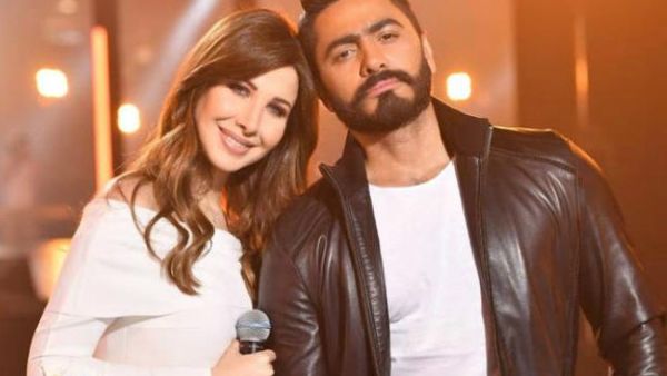 نانسي عجرم و تامر حسني يستقبلان العام الجديد في أبوظبي