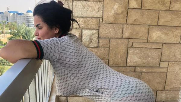 Guards asking Al-Masri to leave because she was not invited