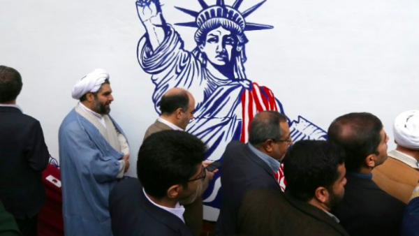 Iran unveils new anti-American murals on the walls of the former US embassy as Tehran prepares to celebrate the 40th anniversary  of the American hostage taking (AFP) 