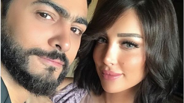 الفنان تامر حسني وزوجته بسمة بوسيل
