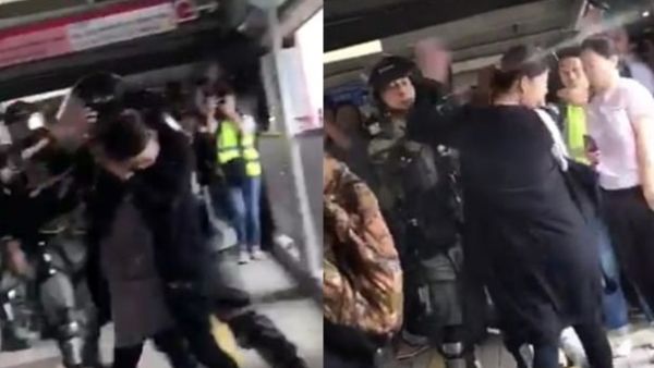 Social media footage shows one Hong Kong riot policeman pepper-spraying a woman  in the face in front of a screaming crowd. The victim is seen with an obvious baby bump in the clip. (Twitter)